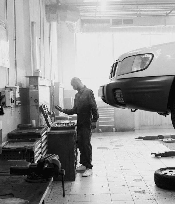 Professional automotive service workshop with modern diagnostic equipment