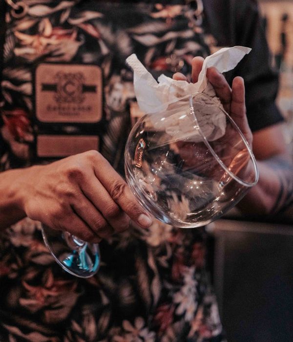 Skilled female detailer performing meticulous interior cleaning